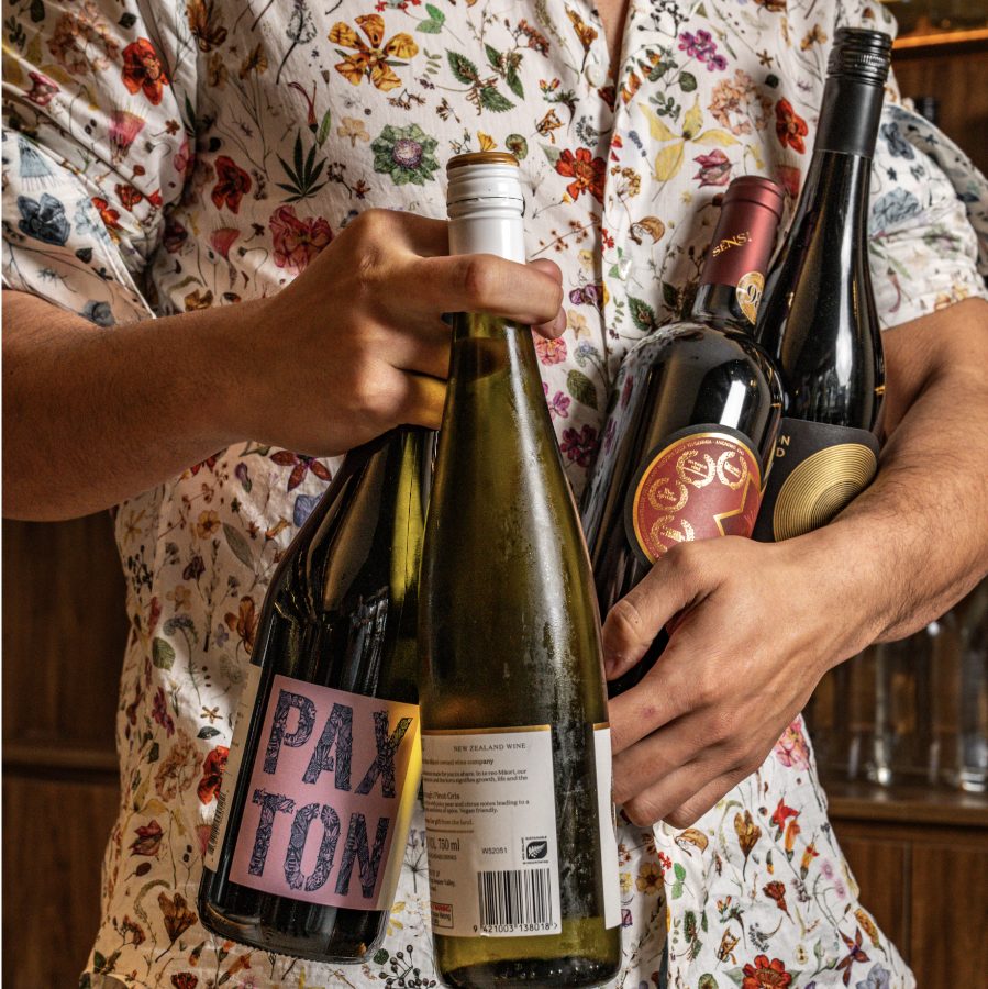 Wine bottle being presented at the table at Angelica Norwest