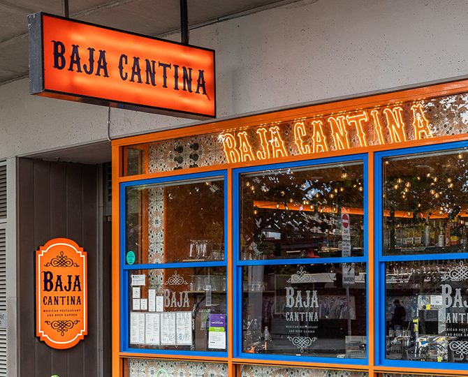 Baja Cantina exterior signage lit at night