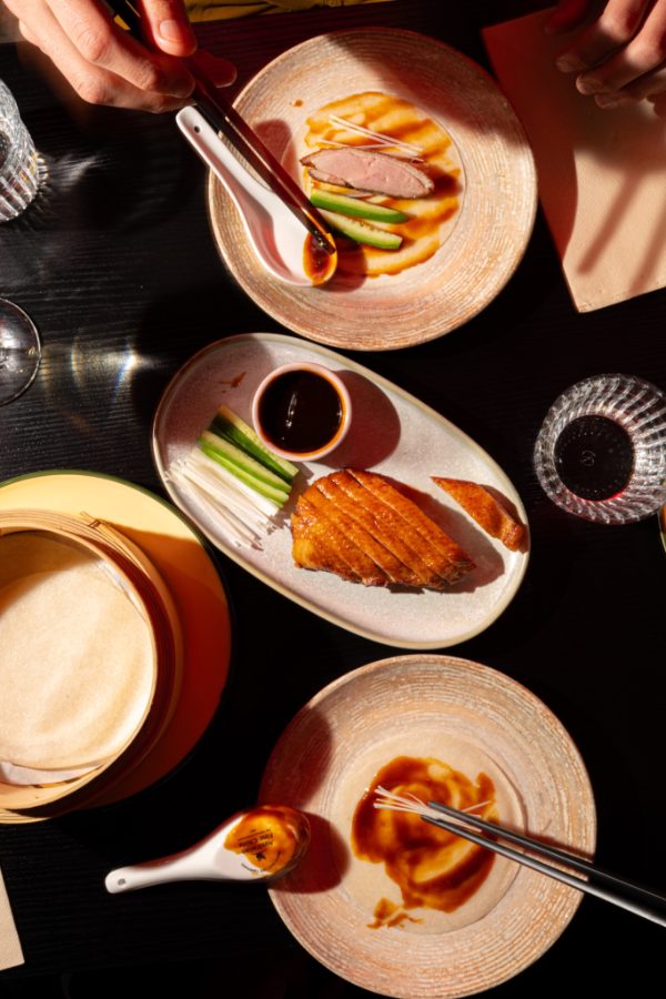 Glazed duck with cucumber and dipping sauce at Lucky You Darling